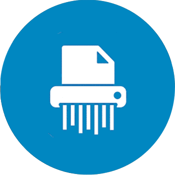 The hand of a person holding a scanner and pointing it at the barcode on the end of an archive box on a shelf